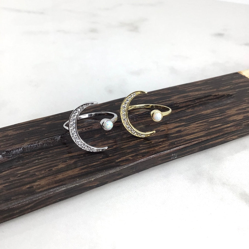 Crescent moon with white opal ring