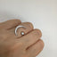 Crescent moon with white opal ring