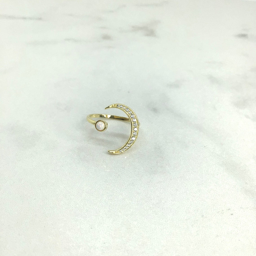 Crescent moon with white opal ring