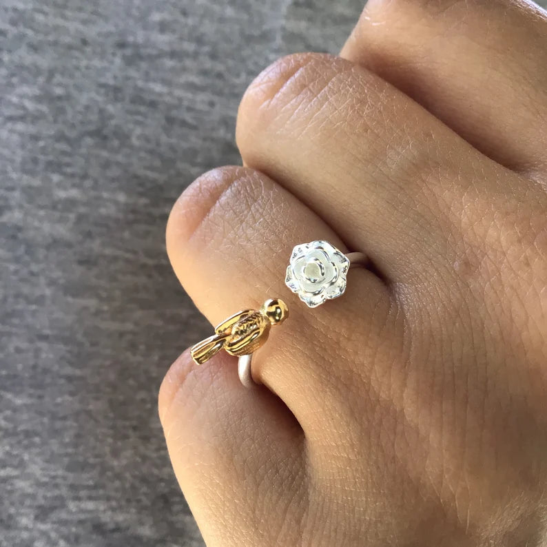 Silver rose with golden bird adjustable ring