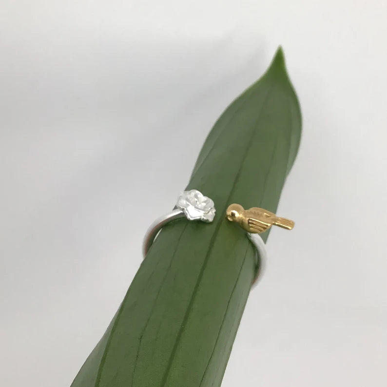 Silver rose with golden bird adjustable ring