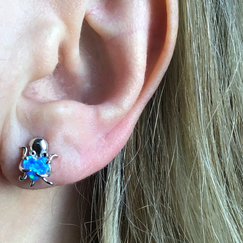 Octopus hugging opal heart stud earring sterling silver
