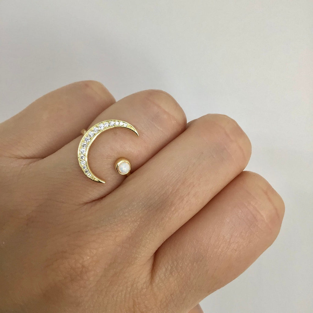 Crescent moon with white opal ring