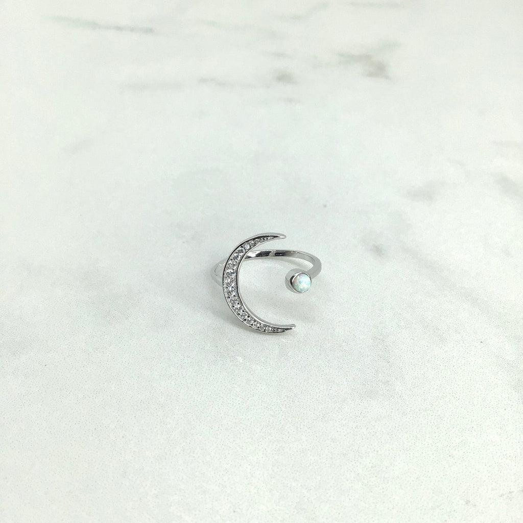 Crescent moon with white opal ring